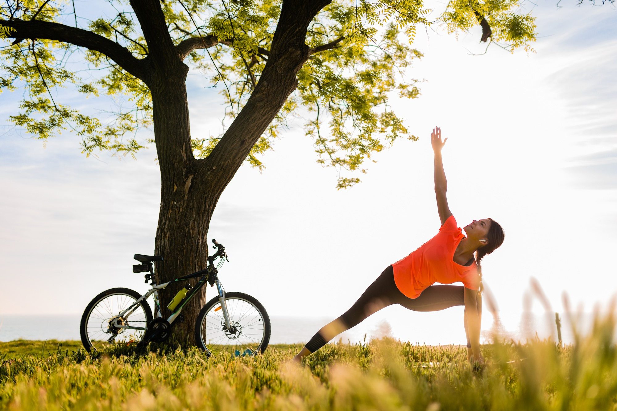 An active person walking outdoors in bright natural light
